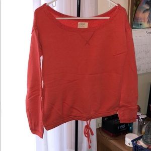 Reddish orange sweater shirt